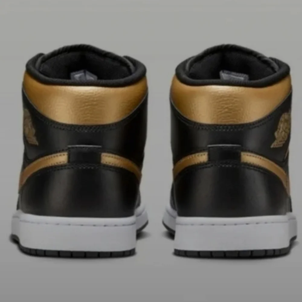 Air Jordan 1 Mid Sneakers Black/White/Metallic Gold